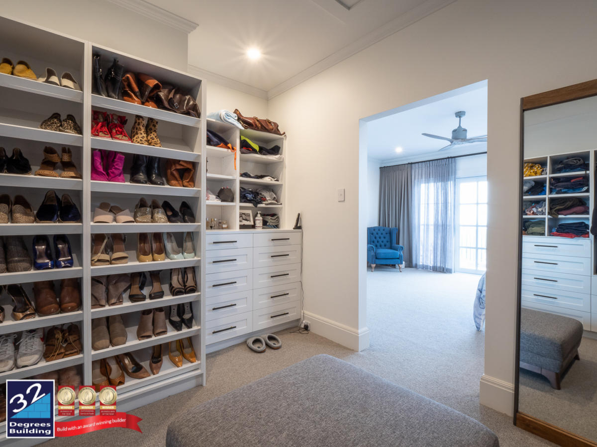 Master bedroom WIR of a Hamptons second storey addition in Coogee. 